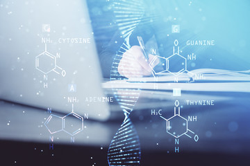 Man's hands working with notes background. Genetic engineering and gene manipulation concept.