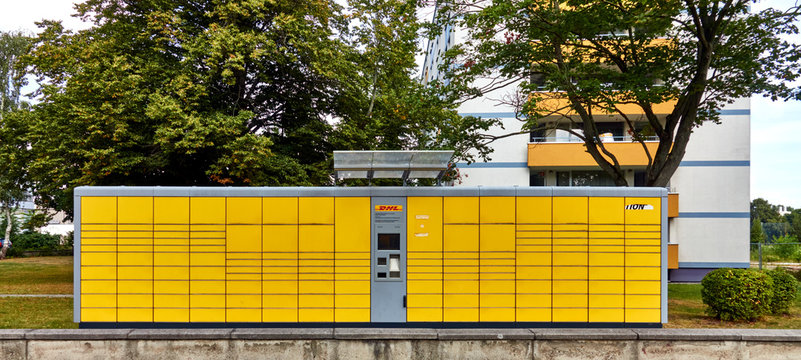 Yellow packing station for storing parcels of the logidtig company DHL in Braunschweig, Germany, August 18., 2020