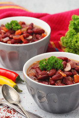 Two bowls with traditional Georgian dish - lobio