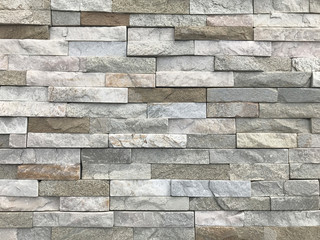 A wall of stone. Natural background and wall of the building.  