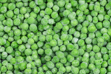 Frozen green peas texture background. ice peas background for food textures. Raw vegetables.