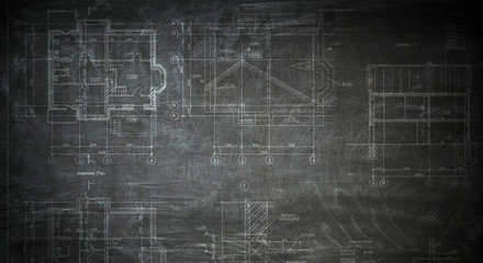 Architectural drafts on black board . Mixed media
