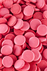 Pink Macarons - traditional french cookies. Top view, macro, background.