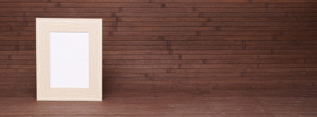 Empty wooden frame mockup on mahogany boards background. Mahogany wooden wall paneling background. Background concept for website.