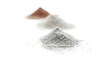 Cosmetics clay of different colors on white background isolation