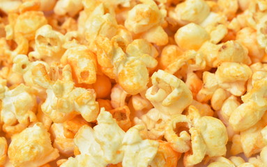 salty baked cheese popcorn arranging on white background