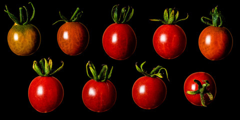 cherry tomatos on a black background