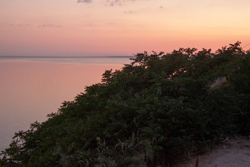 Fototapeta na wymiar Summer Sunset in Berdiansk at the Embankment near the Azov Sea