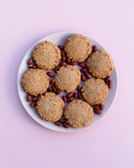 Traditional Sudanese Full Sudani cookies with peanuts. Close-up of homemade cookies on a bright background. Gluten-free peanut flour baked goods. Keto diet, paleo.