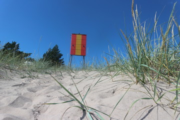 warning sign on the beach in florida