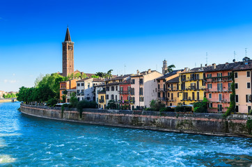 Fototapeta na wymiar View of Verona and the Bell tower of the church of Santa Anastasia from the Ponte Pietra bridge. Verona. Italy