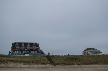 Fototapeta na wymiar Beach and Dunes with Houses in Domburg, Zeeland, Netherlands