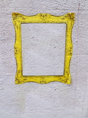 Realistic yellow frame on wall