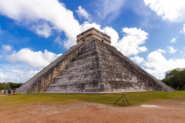 Fototapeta na wymiar Yucatan/Mexico - December 29 2018 : Tourists visit Kukulkan pyramid at Chichen-Itza archaeological site, Yucatan, Mexico.