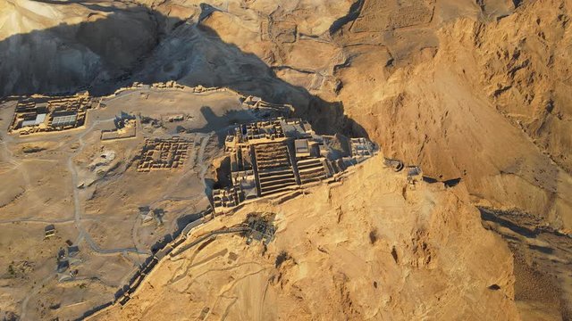 Aerial view of the ruins of Massada is a fortress built by Herod the Great on a cliff-top off the coast of the Dead Sea. Destroyed by the Romans in the 1st century AD e. In UNESCO World Heritage List