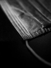 Black and white closeup of a mask