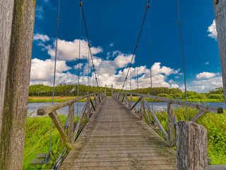 Kong Hans suspension  bridge in Skjern meadows Ringkoebing, Denmark