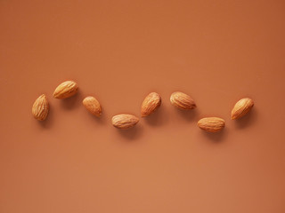 Almonds isolated on background, nut beans
