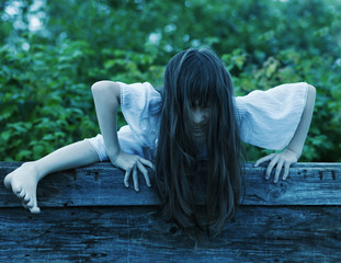 Scary ghost girl climbs out of the well