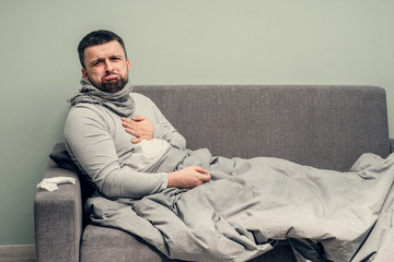 Disease. Cheer at home. A young man is sick, is treated at home. Chest pain, difficulty breathing....