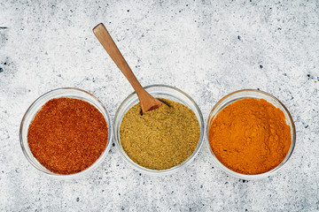 Spices and spices in glass saucers. Cooking and kitchen.