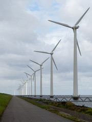 Windmills along the IJsselmeerdijk in Flevoland