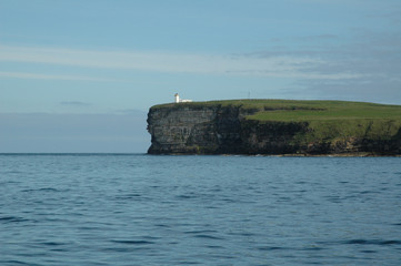 Fototapeta na wymiar Lighthouse and Cliffs