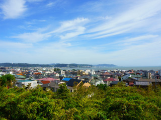 Fototapeta na wymiar View of Kamakura Sagami Bay from second level in Hase-dera temple. Sunny day with blue sky