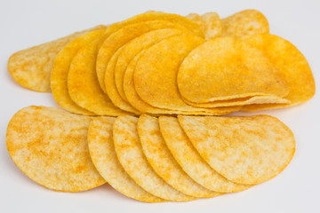 heap of potato crisps snack with paprika