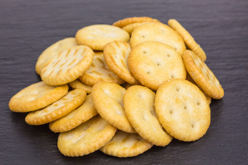 heap of round small crunchy cracker with salt