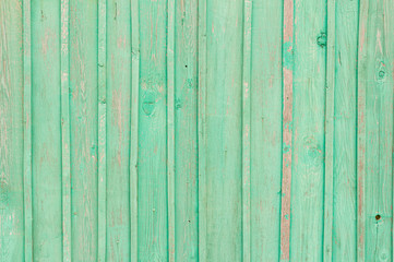 old painted wooden gates with peeling paint