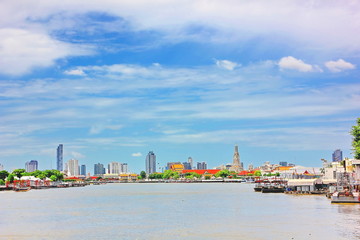 Fototapeta premium landscape of famous community beside choa phra ya river .the main river in Bangkok has important templesand historic landmarks.