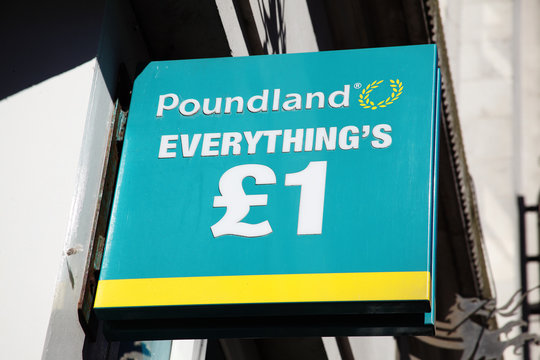 Cardiff, Wales, UK , August 31, 2016 : Poundland logo advertising sign outside its retail business store in Queen Street stock photo image