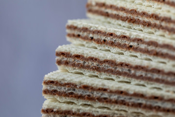 Close up of pile of classic Original Manner Neapolitaner wafers. Manner is wafers filled with hazelnut cocoa cream manufacturer in Austria