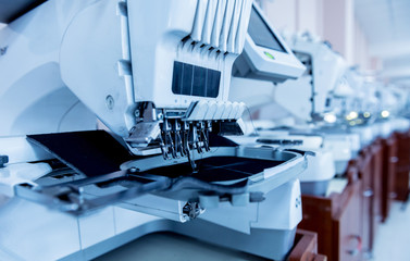 Fabric industry production line. Textile factory. Working tailoring process