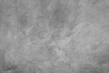 Abstract background of modern loft cement texture. The gray concrete wall has some scratch without a fixed pattern. Can be used in graphic design and for creating various backgrounds.