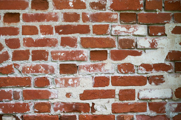 Obraz premium The surface of the outer wall of the old brick building