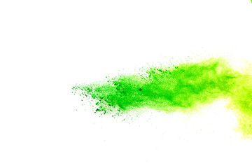 Green powder explosion isolated on white background. Abstract powder cloud.