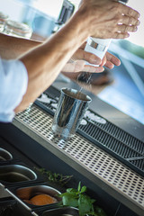 chef preparing a cocktail in restaurant
