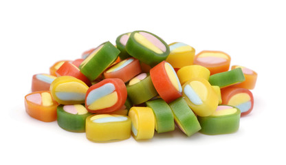 Heap of multicolored sweets isolated.