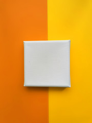 white clean flat cardboard on orange yellow background