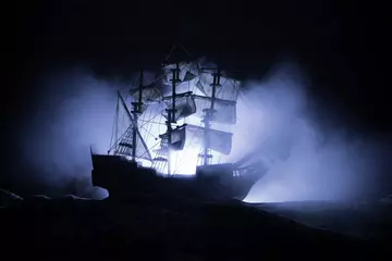 Acrylic prints Schip Black silhouette of the pirate ship in night