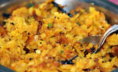 indian breakfast tasty food poha paddy food in a plate