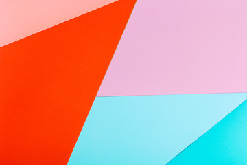 geometric flat lay composition of bright colored paper