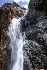 beautiful waterfall next to the river in Ourika valley	