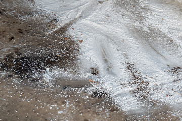 Absorbent Sweeping Powder On A Garage Floor