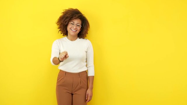Young african american woman showing number one
