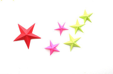 Origami paper stars on white
