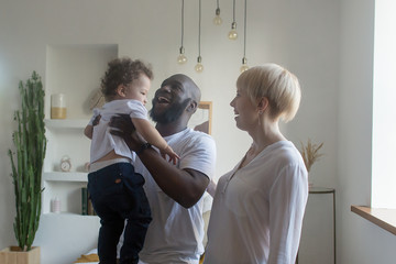 happy family at home, different nationalities