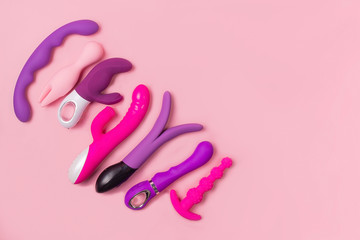 on a pink background sex product, toy for adults